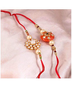 Orange round kundan stone with beads rakhi with flower rakhi