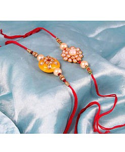 Yellow round kundan stone with beads rakhi with flower rakhi