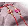 Pink square kundan stone with beads rakhi with flower rakhi