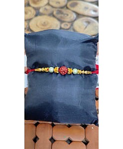 One Rudraksha with two sea green beads dhaga rakhi