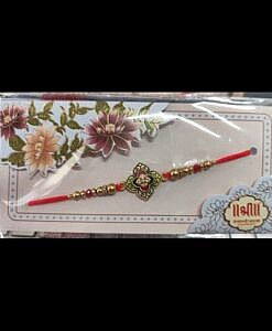 Four petals flower rakhi with chawal chandan tika pack