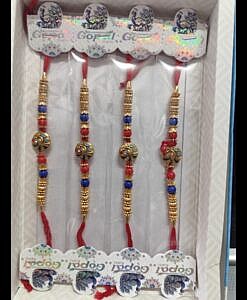 Beautiful round red and blue design rakhi with chawal chandan tika pack