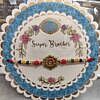 Beautiful Super Brother rakhi with round packing and chawal chandan tika pack