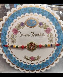 Beautiful Super Brother rakhi with round packing and chawal chandan tika pack