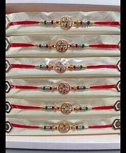 Round design rakhi with chawal and chandan tika pack