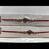 Small red stone circle Rakhi