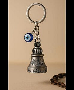 Silver colour gradian bell key ring with evil eye charm