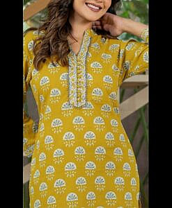 Yellow printed soft cotton short kurti top with potli buttons