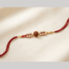 One rudraksh with golden long bead