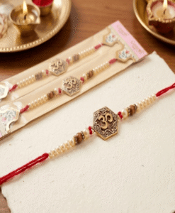 Big Om Rakhi with chawal and chandan tika pack